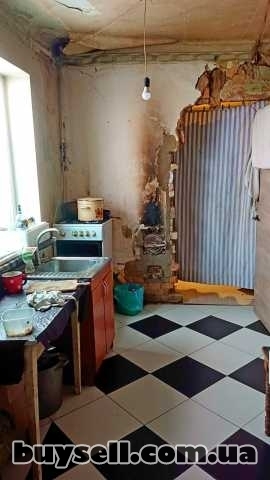 Продам частину будинку в Центрі.Окремий двір.Всі комунікації.