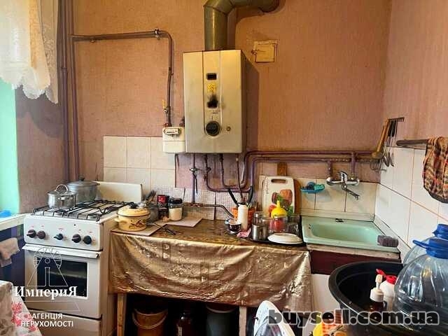Продам кімнату з балконом на Критому Ринку.