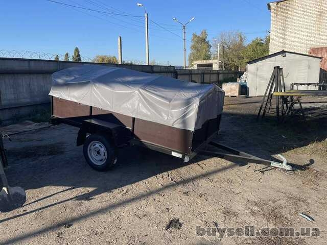 Новий автомобільний причіп 210х130х43 баклеітовий