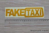 Наклейка на авто FakeTaxi желтая светоотражающая