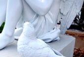 Светлая память в образе ангела памятник ребёнку.