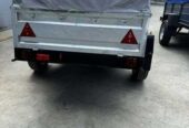 Новий причіп до легкового авто 200х130х40 (борти-цинк)