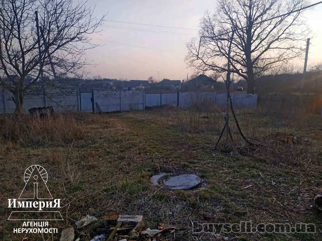 Продам дом в Чепилиевке. 25 соток.Газ,свет,вода.