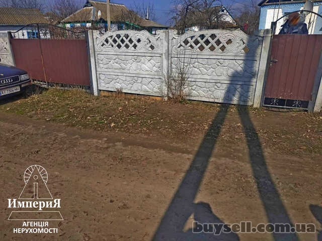 Продам дом в Чепилиевке. 25 соток.Газ,свет,вода.