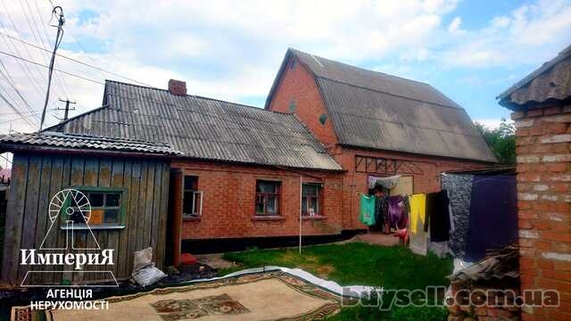 Продам кирпичный дом на два входа со всеми коммуникациями.
