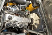 навантажувач Komatsu, з бічним зсувом та щоглою 4.5 метри