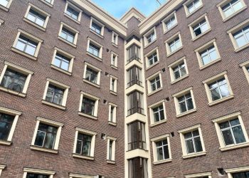 Облицювальна плитка для фасаду будинку: матеріали, види та технології монтажу