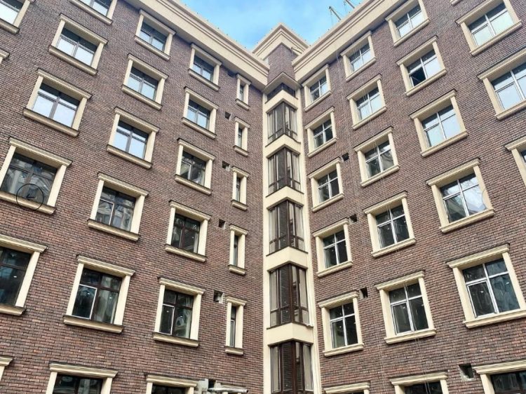 Облицювальна плитка для фасаду будинку: матеріали, види та технології монтажу